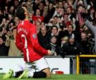 Криштиану Роналду празднует гол, когда он играл за «Манчестер Юнайтед»
